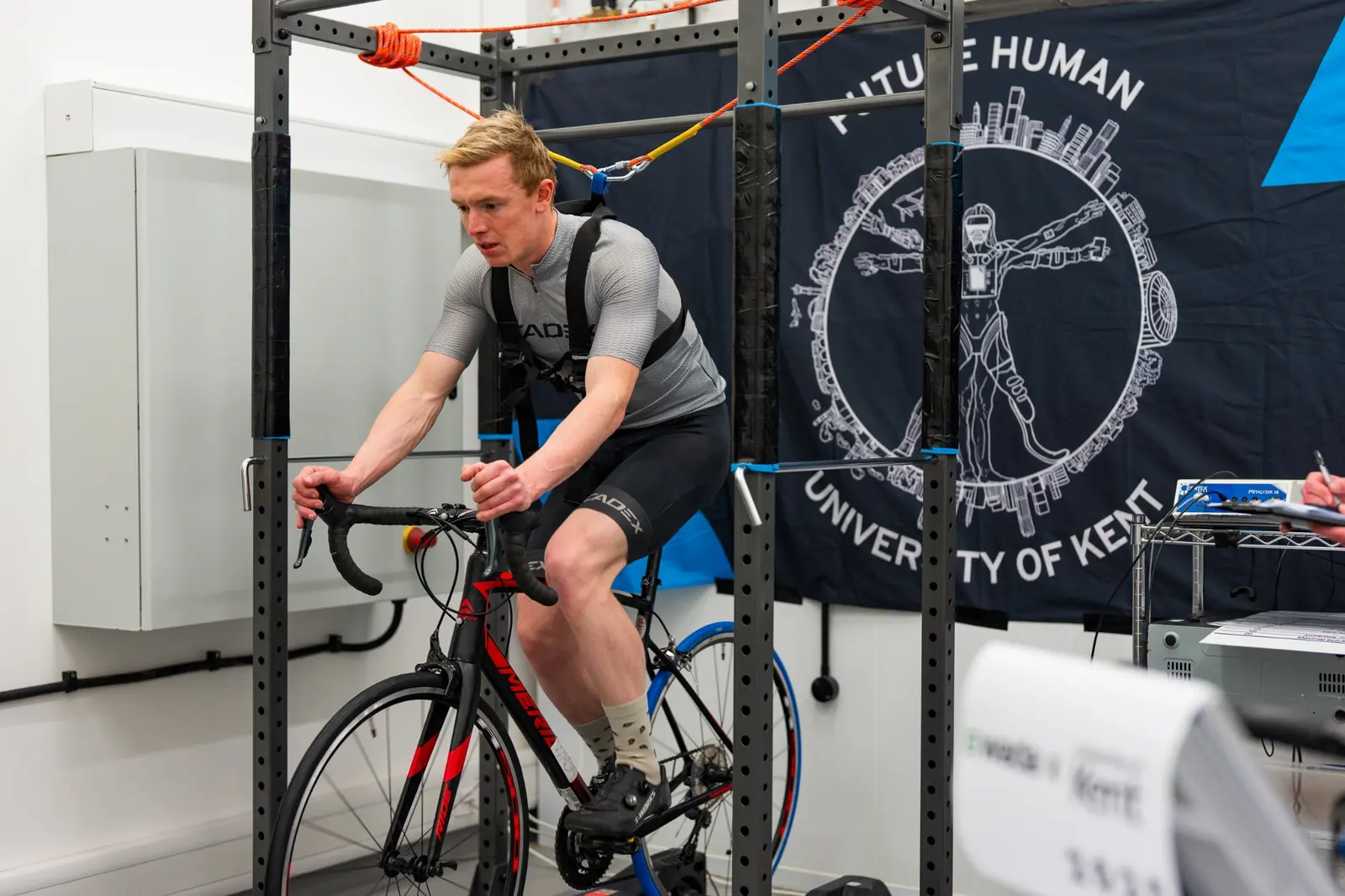 Cyclist undertaking laboratory-based performance testing