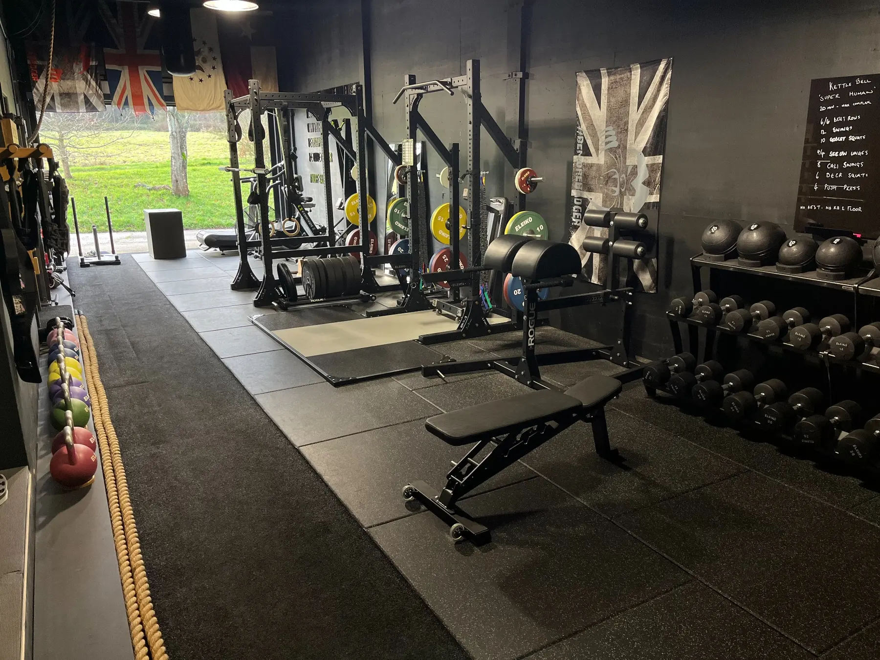 Private strength and conditioning gym in Canterbury with free weights, racks and dedicated training platforms