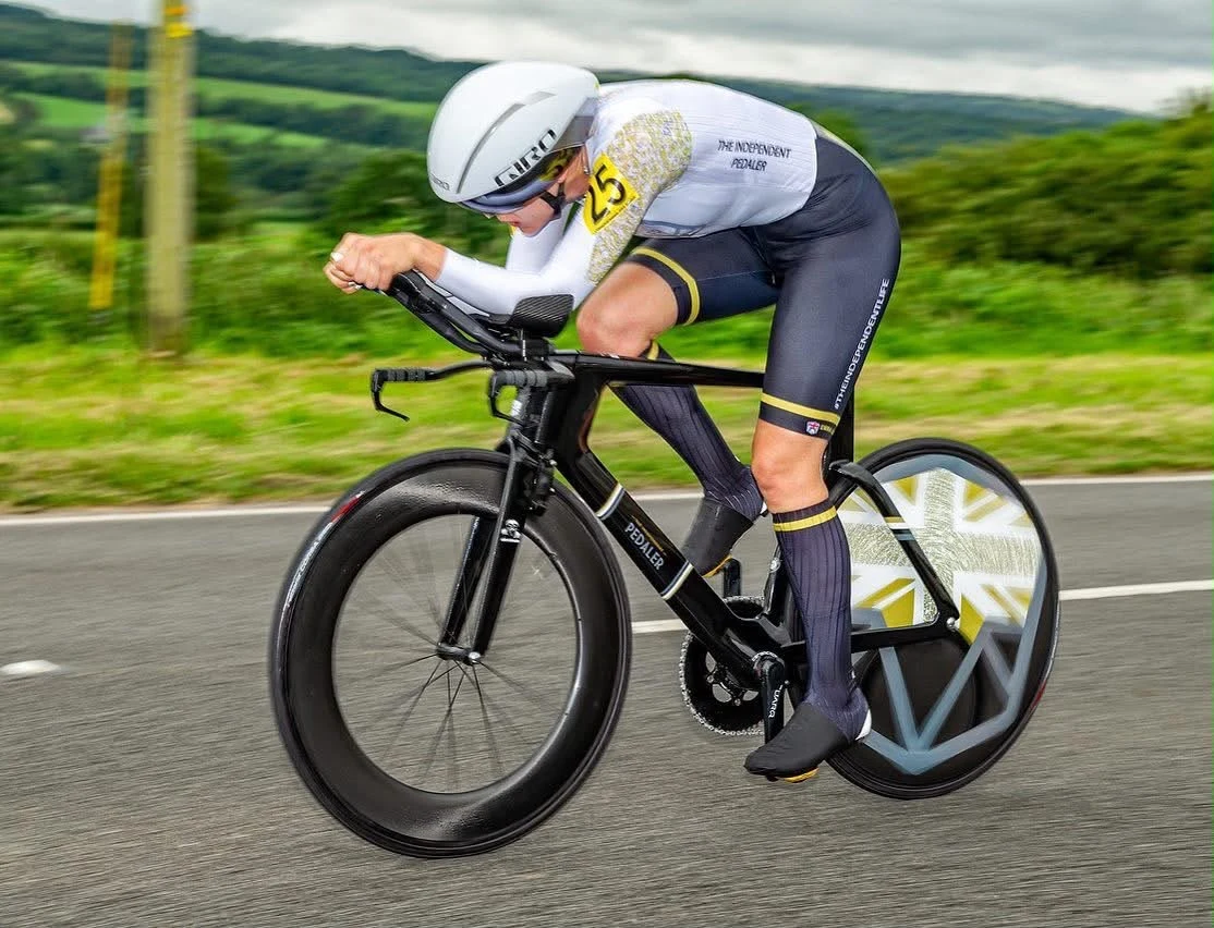 Time-trial cyclist racing in an aerodynamic position